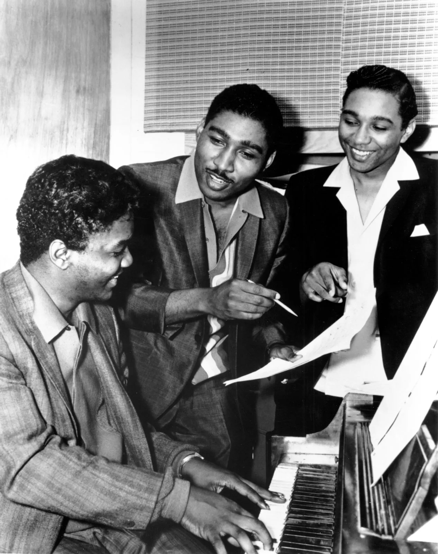 Lamont Dozier, Brian Holland, and Eddie Holland.